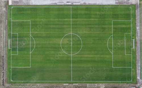 Aerial view of an empty green soccer field. football game