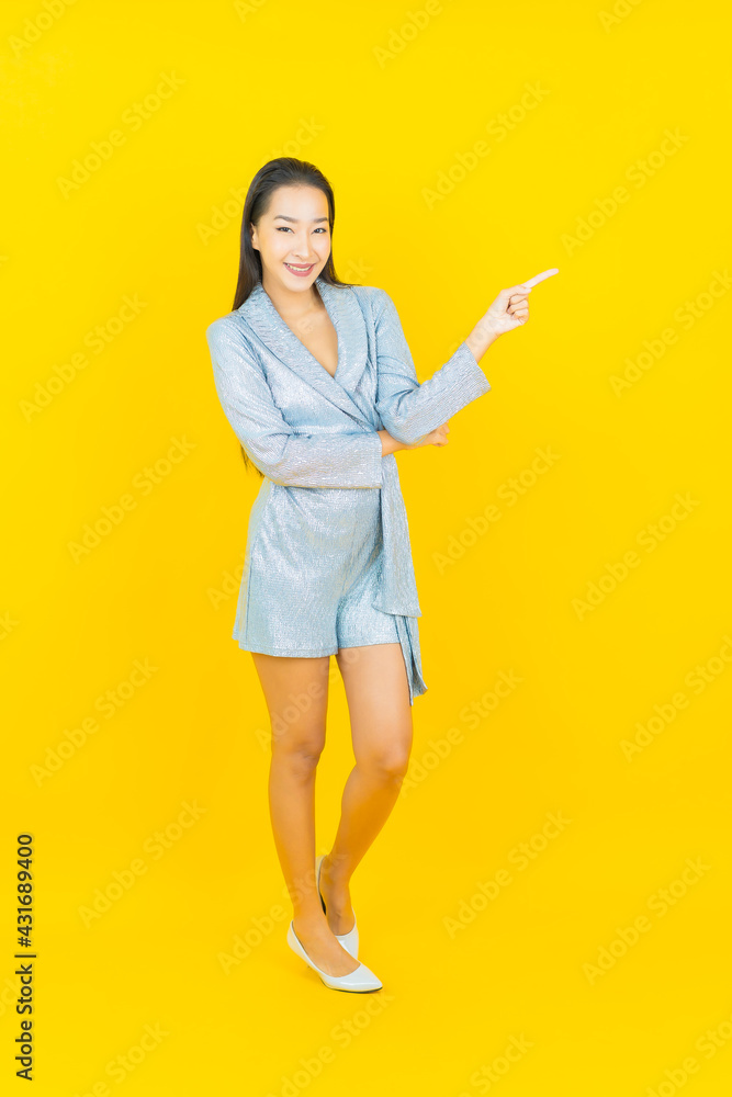 Portrait beautiful young asian woman smile with action Portrait beautiful young asian woman smile with action
