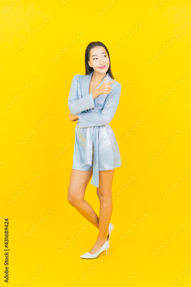 Portrait beautiful young asian woman smile with action Portrait beautiful young asian woman smile with action
