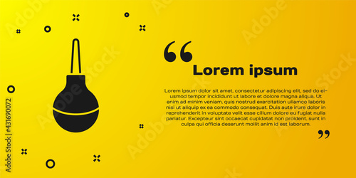 Black Enema icon isolated on yellow background. Enema with a plastic tip. Medical pear. Vector
