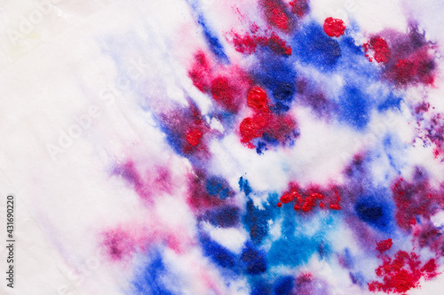 watercolour brush strokes with paint on paper. blue and purple