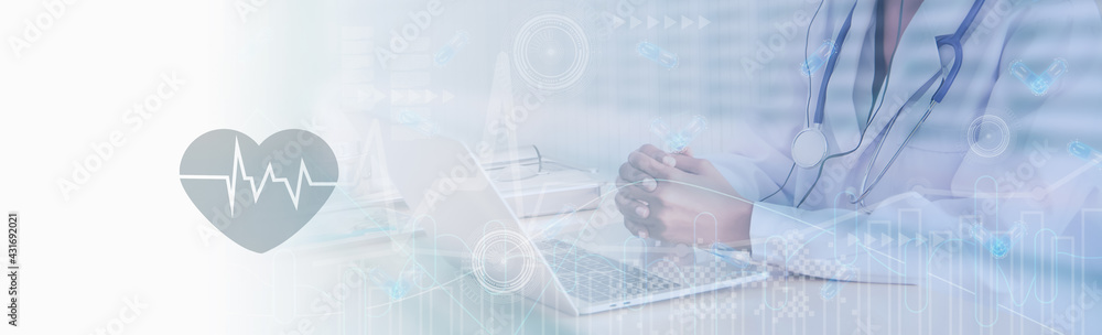 Soft focus-doctor working to laptop computer,online technology marketing business of medical,healthcare,insurance,stock graph and diagram,medical examination analysis report,banner panoramic header Soft focus-doctor working to laptop computer,online technology marketing business of medical,healthcare,insurance,stock graph and diagram,medical examination analysis report,banner panoramic header