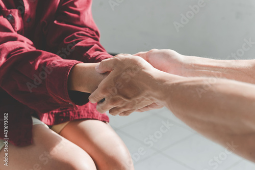 Christian couple holding hands. Two people are praying together. pray together, Hands folded in prayer concept for faith