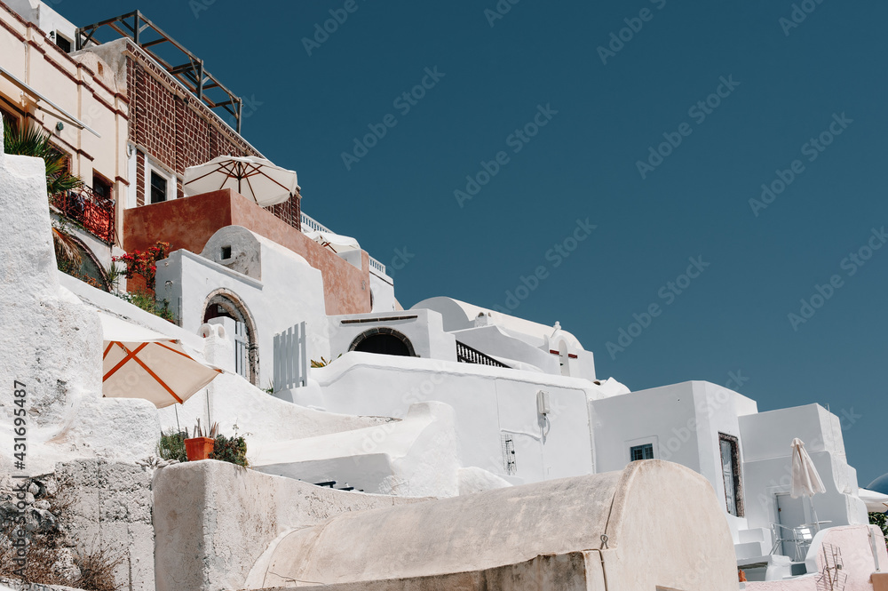Fototapeta premium Houses on a coast of sea Oia Santorini Greece