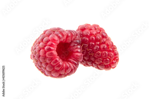 Fresh raspberry fruit isolated on white background. Two red raspberries