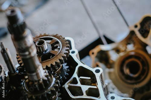 Assemble the motorcycle engine gear by a maintenance technician and check it.