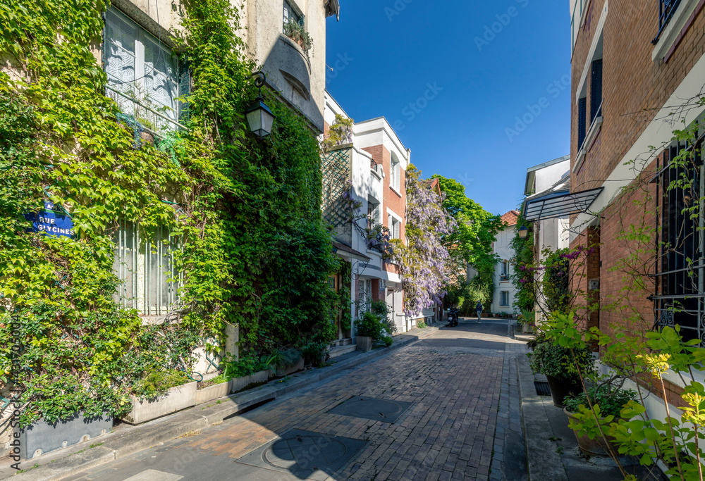 Paris, France - April 26, 2021: The floral city (Cité florale) is a residential area located in the 13th arrondissement of Paris, France. It forms a triangular area with individual houses