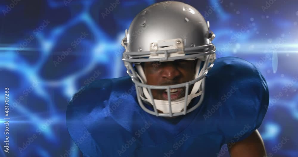 Animation of american football player in helmet over blue glowing background Animation of american football player in helmet over blue glowing background
