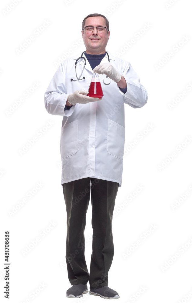 in full growth. smiling doctor with a laboratory flask . in full growth. smiling doctor with a laboratory flask .