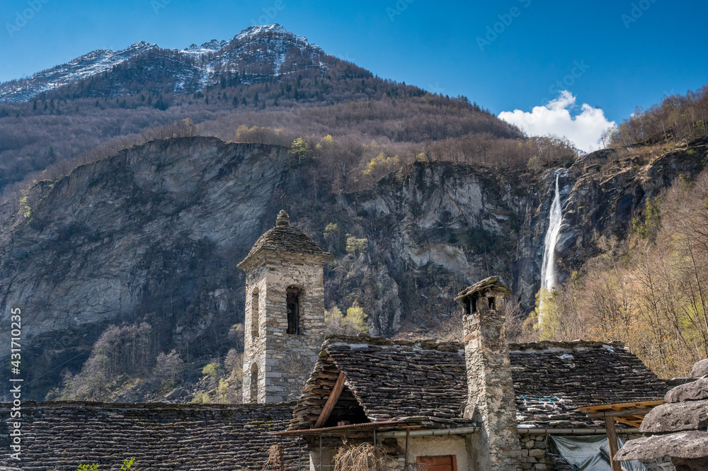 rustico stone houses in Foroglio with Cascata di Foroglio, Ticino