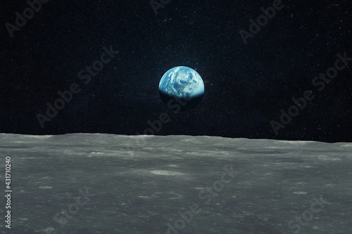 Fototapeta Naklejka Na Ścianę i Meble -  Blue planet earth view from the moon. Travel to the moon. Space wallpaper