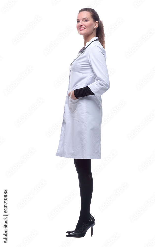 side view. young woman doctor looking at a white screen. side view. young woman doctor looking at a white screen.