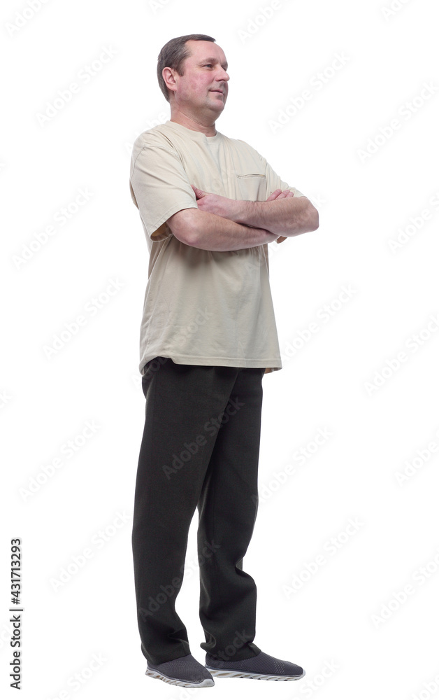 in full growth. confident mature man looking at you. in full growth. confident mature man looking at you.