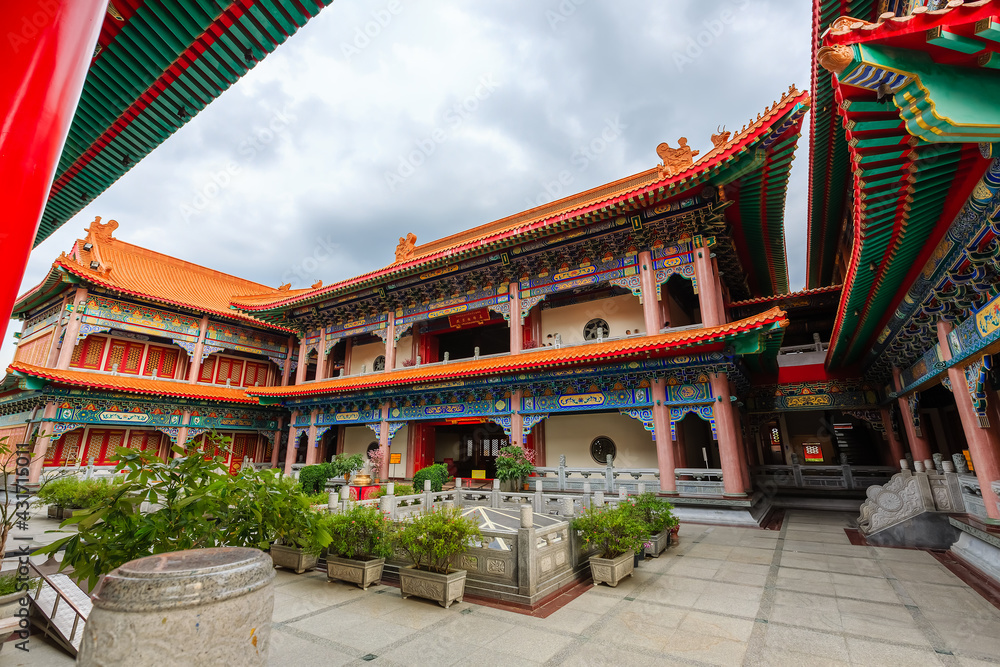 Fototapeta premium Golden Wood Statue of Guan Yin with 1000 hands at Chinese temple in Thailand