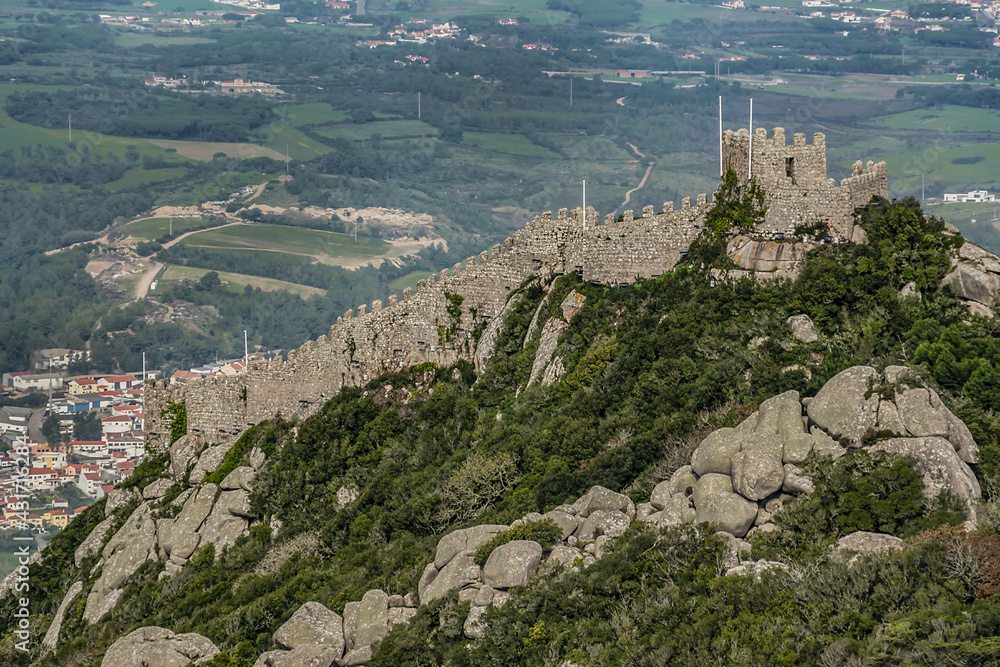 Castle of the Moors (Castelo dos Mouros) - hilltop medieval castle located in municipality of Sintra, about 25km northwest of Lisbon. Moors Castle built by Moors in 8th - 9th centuries. Portugal.