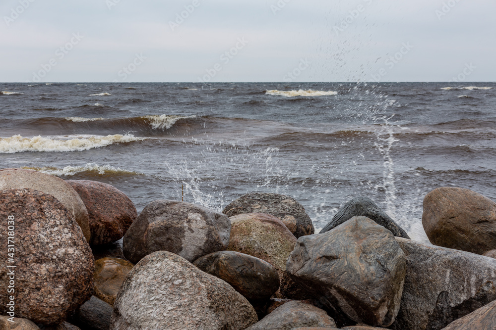 Waves splashing on the rocky coast of Ladozhskoe lake. Waves splashing on the rocky coast of Ladozhskoe lake.