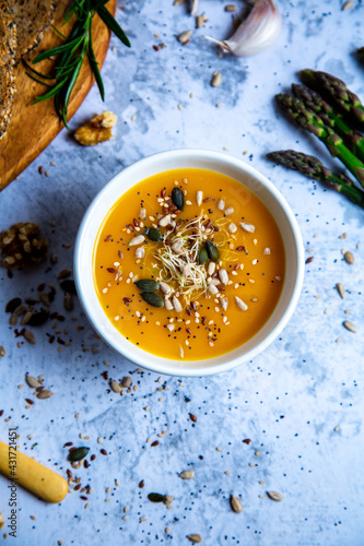 Pumpkin soup with vegetables and bread