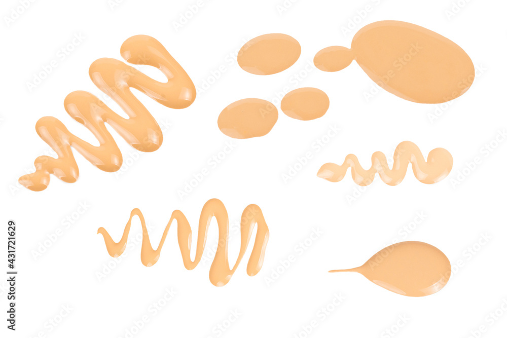 Liquid foundation swatch isolated on white background. Close Up of makeup cream sample.