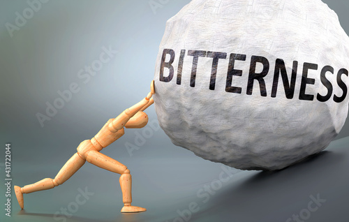 Fotografi Bitterness and painful human condition, pictured as a wooden human figure pushin