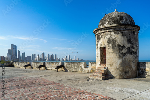 The city walls in Cartagena, Colombia, with the Bocagrande skyline in the distance.