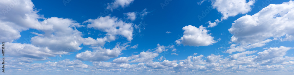 Obraz premium Blue Sky background with tiny Clouds. Panorama background