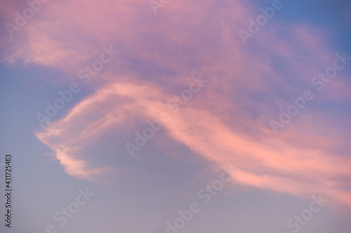 Evening purple sky in golden time with strange cloud shape