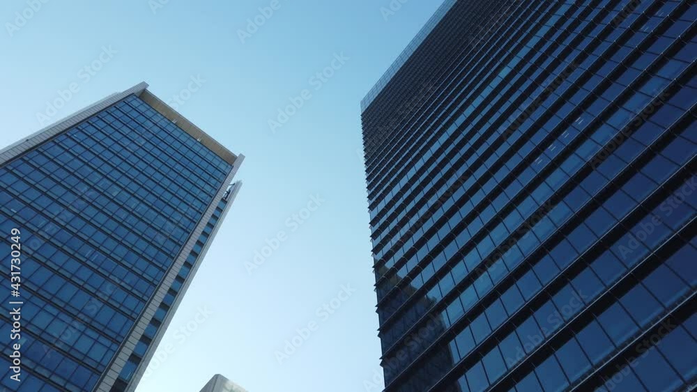 POV to the sky with many skyscraper office building in the big city POV to the sky with many skyscraper office building in the big city