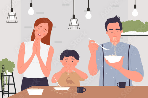 Happy family people eat pasta spaghetti or noodles, cute family home scene in kitchen