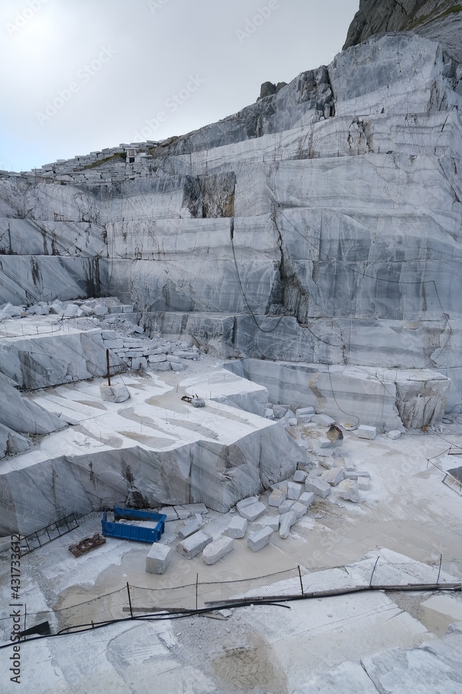 White marble quarries on the Apuan Alps in Tuscany.Quarries near the Passo della Focolaccia with stepped mountain cut.  Alpi Apuane, near Carrara, Italy. 
