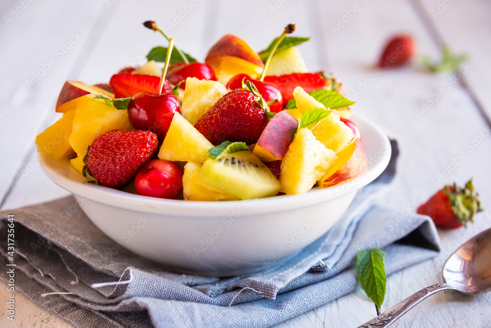 Fresh fruit salad with strawberries and cherries Fresh fruit salad with strawberries and cherries