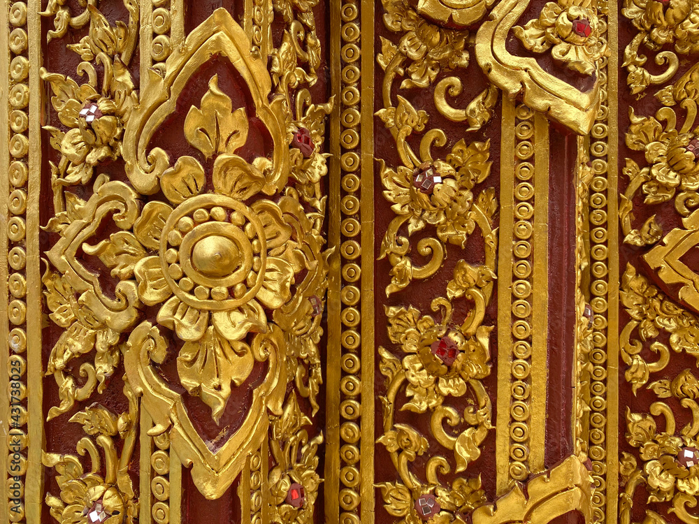 Thai traditional flower or kanok pattern design wall for temple.