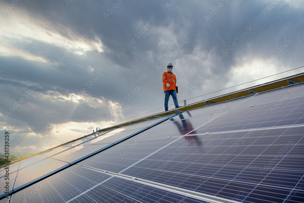 industrial technician engineer Solar panel electrical check with digital insulation tester industrial technician engineer Solar panel electrical check with digital insulation tester