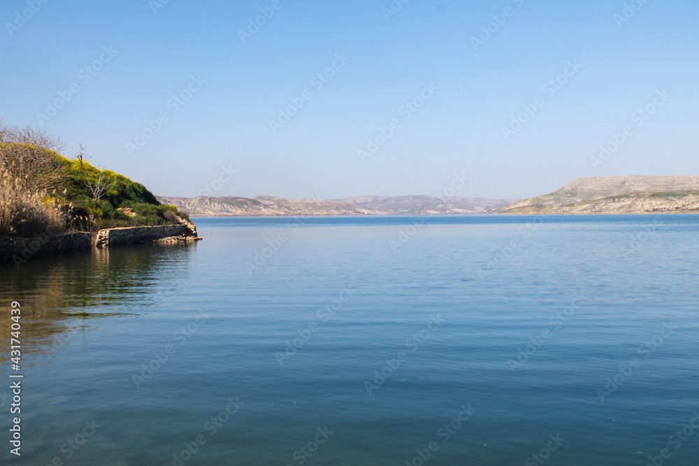 Beautiful lake surrounded by green forests Beautiful lake surrounded by green forests