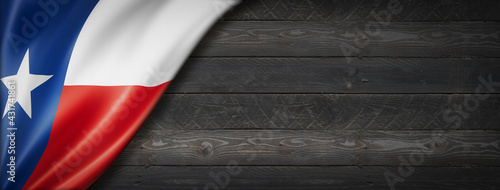 Texas flag on black wood wall banner, USA photo