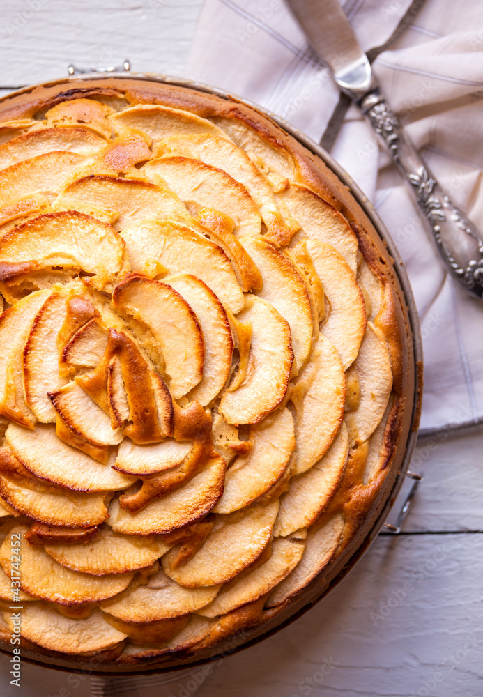 Apple pie, delicious pastry dessert with slices of apple on top Apple pie, delicious pastry dessert with slices of apple on top