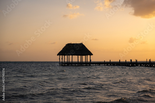 Beautiful sunset over a pier in Holbox, Mexico. Holbox sunset.  © LP Productions