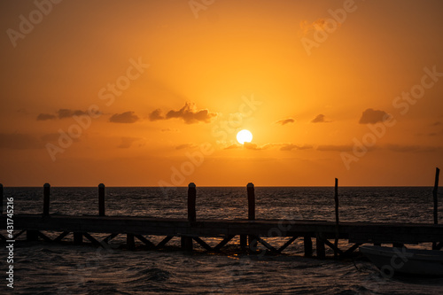 Beautiful sunset over a pier in Holbox  Mexico. Holbox sunset. 