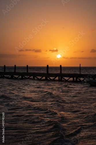 Beautiful sunset over a pier in Holbox, Mexico. Holbox sunset. 