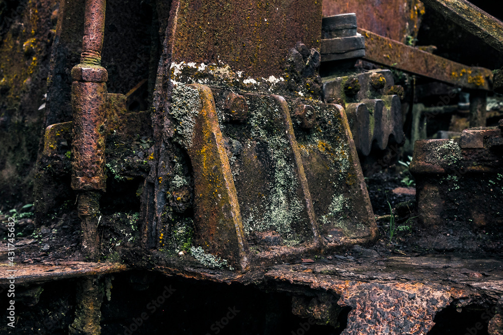 Rusty locomotive. A small part of a locomotive.