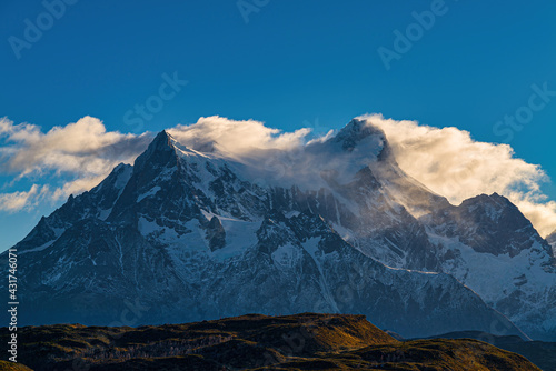 Ice covered peaks and clouds over Cerro Paine Grande in southern Chilean Patagonia, Torres del Paine