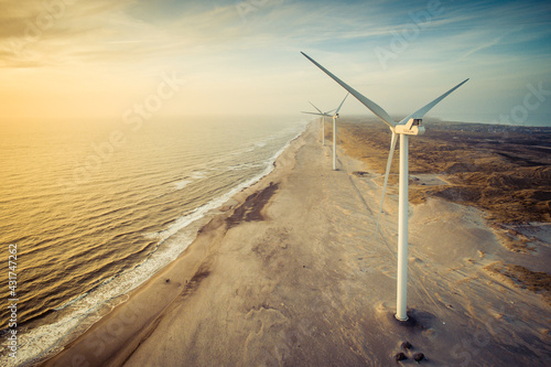 wind turbine on the beach at sunset in Denmark 