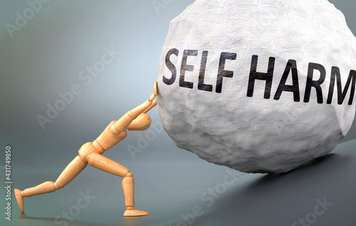 Photography Self harm and painful human condition, pictured as a wooden human figure pushing