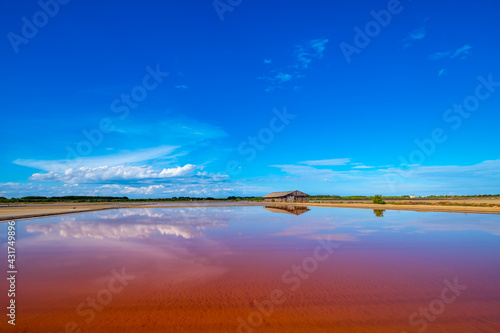 Salt barn with blue sky background in salt fields at Bang Tabun city of Petchaburi province  Thailand