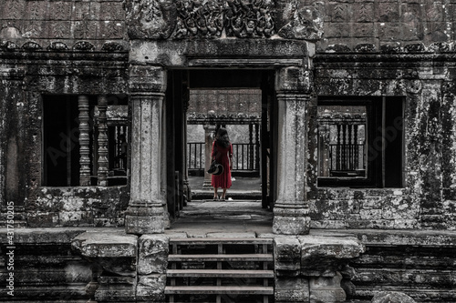 Woman with Red Dress at an Ancient Asian Temple 