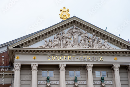 April 28, 2021, Amsterdam, Netherlands, Facade with religious reliefs of the Concertgebouw (concert hall) in Amsterdam, Netherlands, 19th century Neoclassical style
