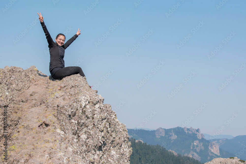 woman in the mountain enjoying the landscape woman in the mountain enjoying the landscape