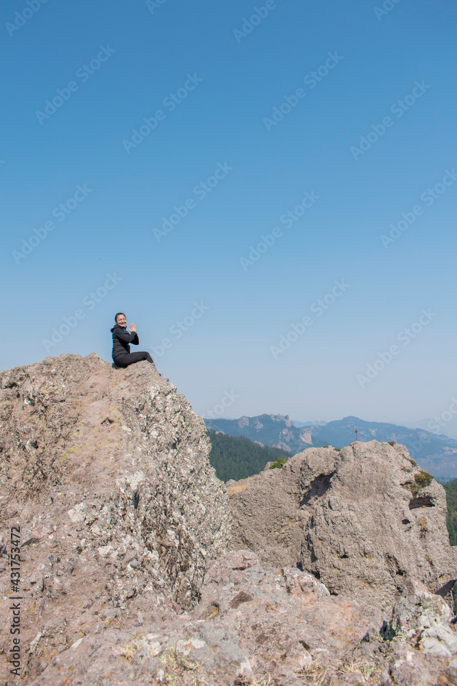 woman in the mountain enjoying the landscape