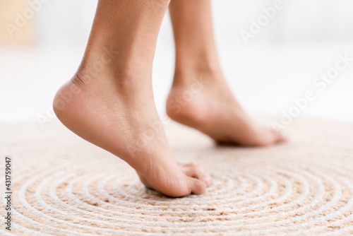 Close up healthy soft woman`s feet. Barefoot. Cares about a woman's clean and soft foot skin. Body care concept. Female soles, fungal infection © InsideCreativeHouse