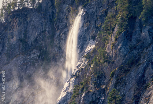 A wild waterfall somewhere in a Scandinavian forest  Norway