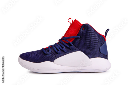 Colored sneakers close-up. Modern trendy sneakers side view. Fashionable sneakers isolate on a white background. 